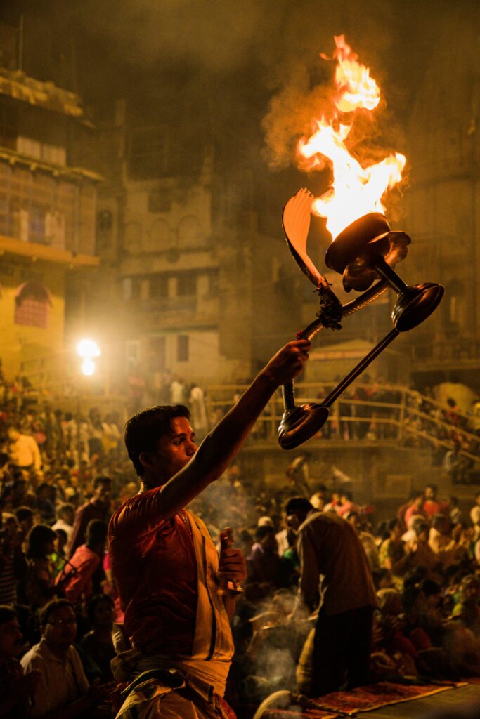 An aarti ritual performed on the Ganges River ghats in Varanasi, India.